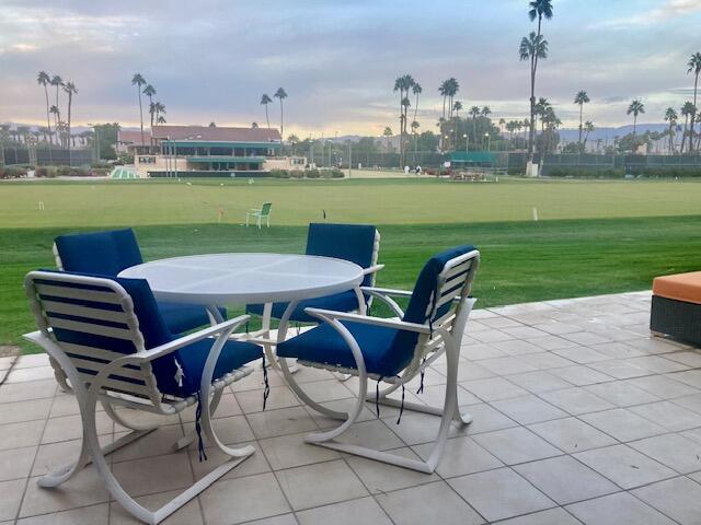 118 Racquet Club Drive South Rancho Mirage, CA 92270 - Photo 5 of 33 a view of a chairs and table on the terrace
