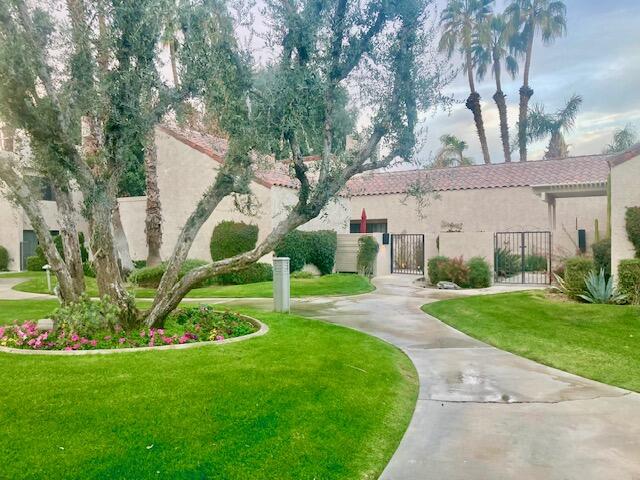 118 Racquet Club Drive South Rancho Mirage, CA 92270 - Photo 6 of 33 a view of a back yard of the house