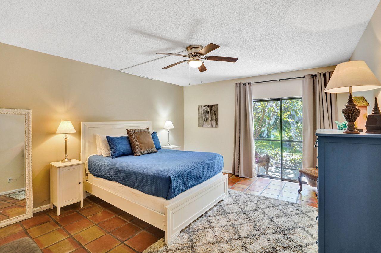 13334 Polo Club Road, Unit 230 Wellington, FL 33414 - Photo 16 of 46 Master Bedroom to Slider