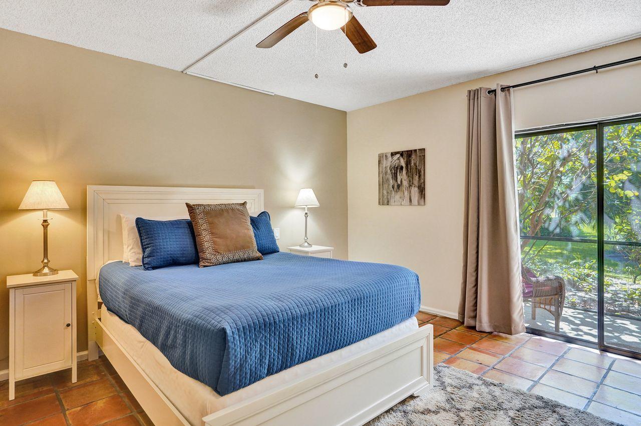 13334 Polo Club Road, Unit 230 Wellington, FL 33414 - Photo 17 of 46 Master Bedroom to Slider