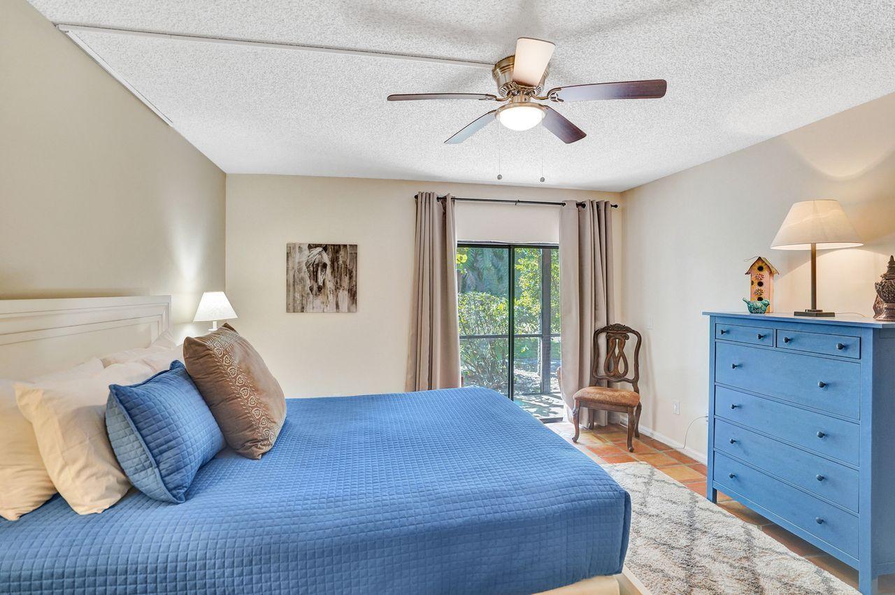 13334 Polo Club Road, Unit 230 Wellington, FL 33414 - Photo 20 of 46 Master Bedroom to Slider