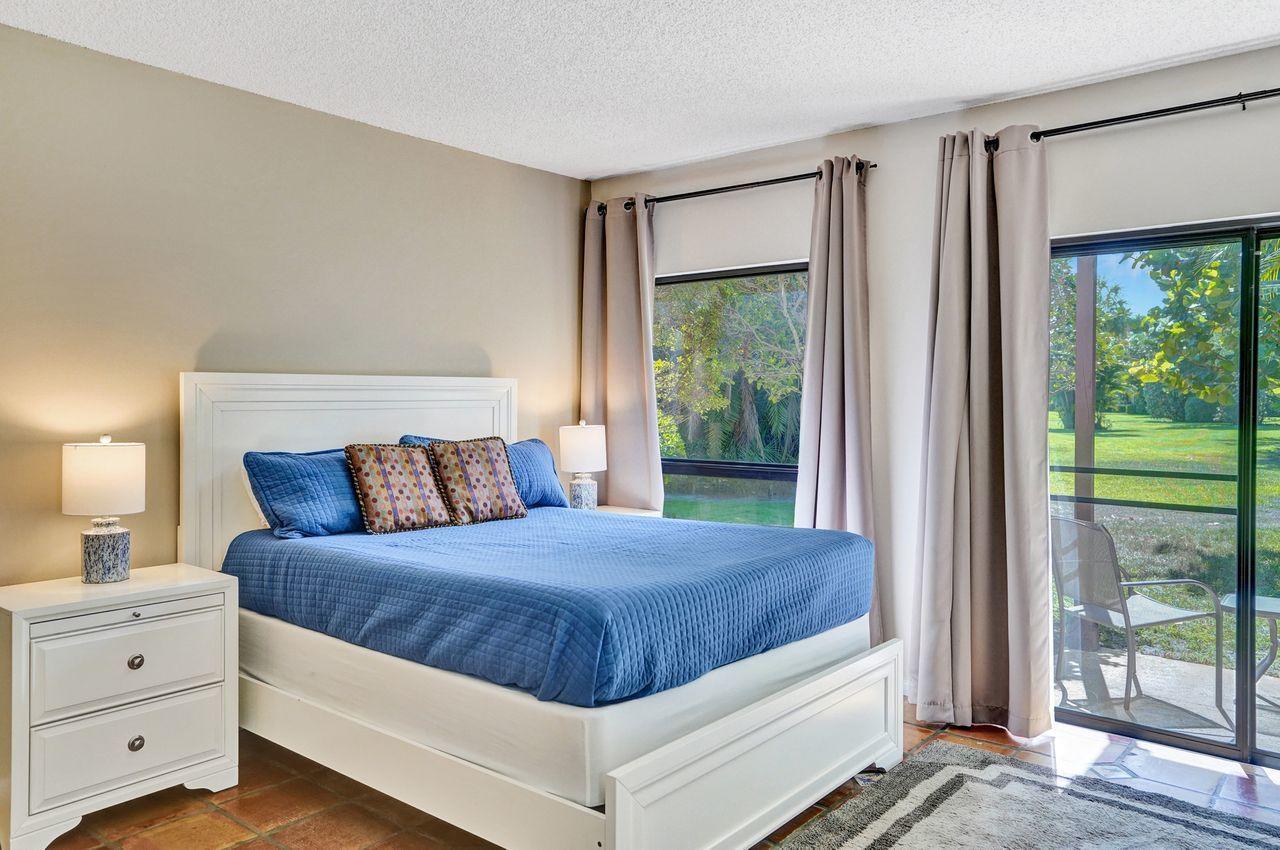13334 Polo Club Road, Unit 230 Wellington, FL 33414 - Photo 28 of 46 2nd Bedroom Close-up Window Slider View