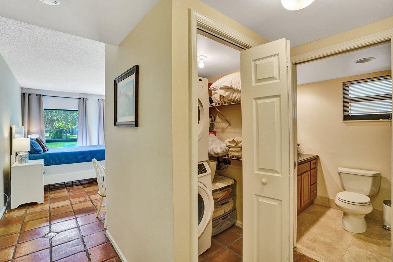 13334 Polo Club Road, Unit 230 Wellington, FL 33414 - Photo 33 of 46 2nd Bedroom Laundry Closet