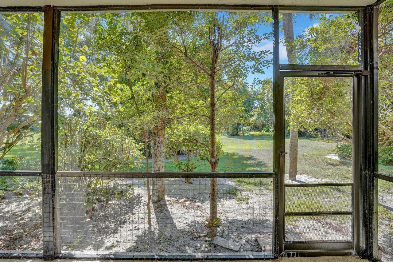 13334 Polo Club Road, Unit 230 Wellington, FL 33414 - Photo 36 of 46 Patio View to Backyard