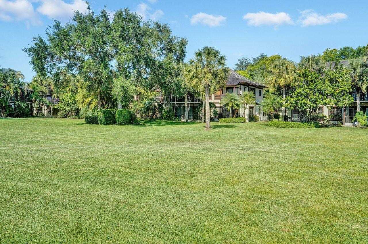 13334 Polo Club Road, Unit 230 Wellington, FL 33414 - Photo 39 of 46 Backyard to Condo View