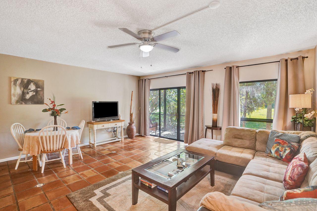 13334 Polo Club Road, Unit 230 Wellington, FL 33414 - Photo 5 of 46 Livng Area to Sliders Outside