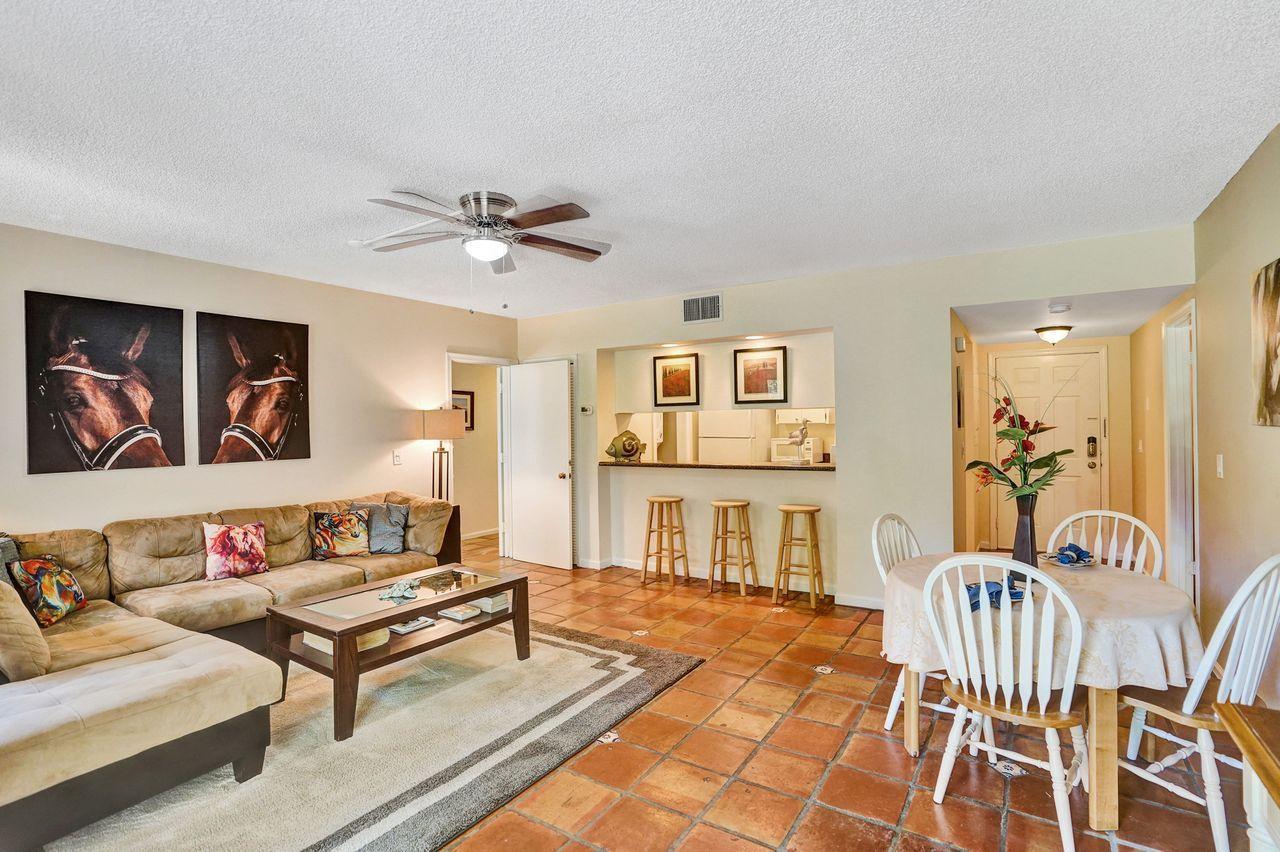 13334 Polo Club Road, Unit 230 Wellington, FL 33414 - Photo 6 of 46 Livng Area to Foyer-Kitchen