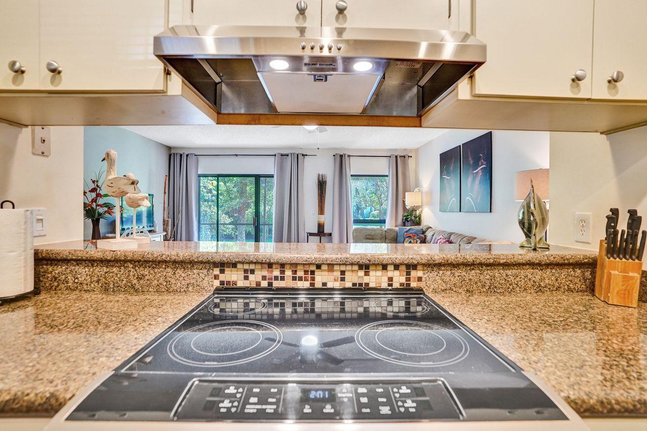 13334 Polo Club Road, Unit 230 Wellington, FL 33414 - Photo 10 of 46 Kitchen Passthru to Living Area