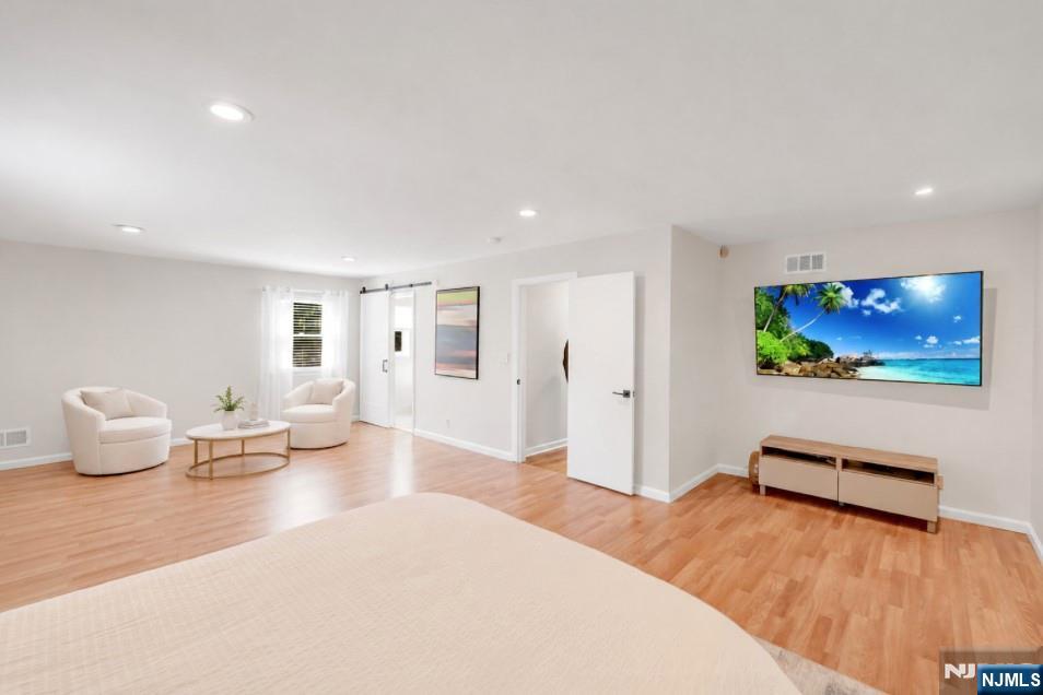 433 Piermont Road Cresskill, NJ 07626 - Photo 16 of 49 a living room with furniture and a flat screen tv