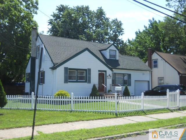 123 Vineyard Road Edison, NJ 08817 - Photo 1 of 14 a front view of a house with a yard