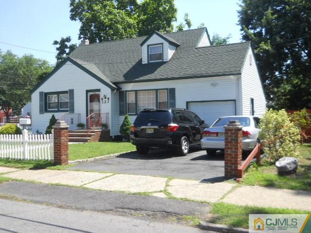 123 Vineyard Road Edison, NJ 08817 - Photo 2 of 14 a front view of a house with a garden and plants