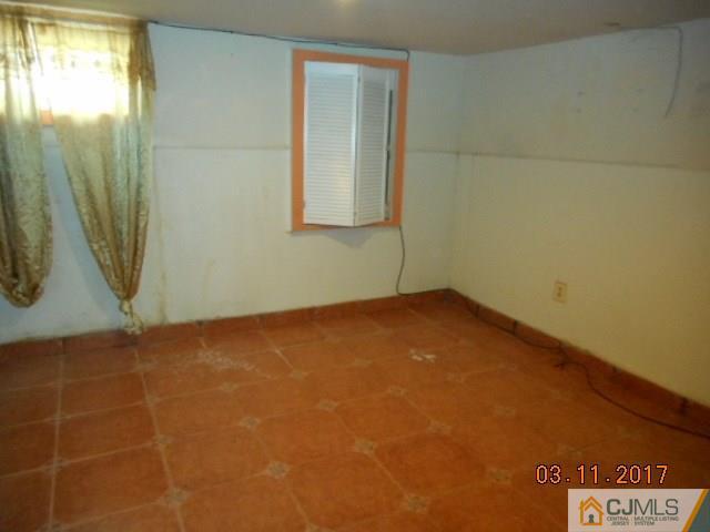 123 Vineyard Road Edison, NJ 08817 - Photo 13 of 14 a view of empty room with windows
