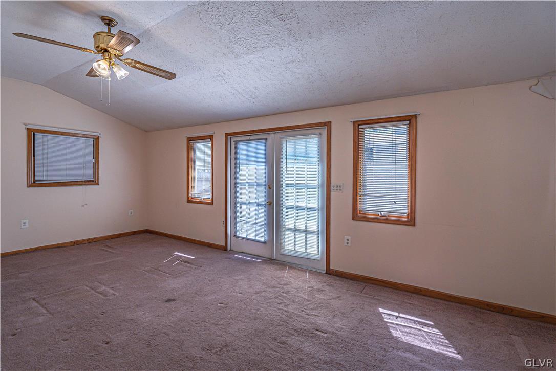 1177 Arcadia Street Bethlehem, PA 18018 - Photo 12 of 32 an empty room with windows and fan