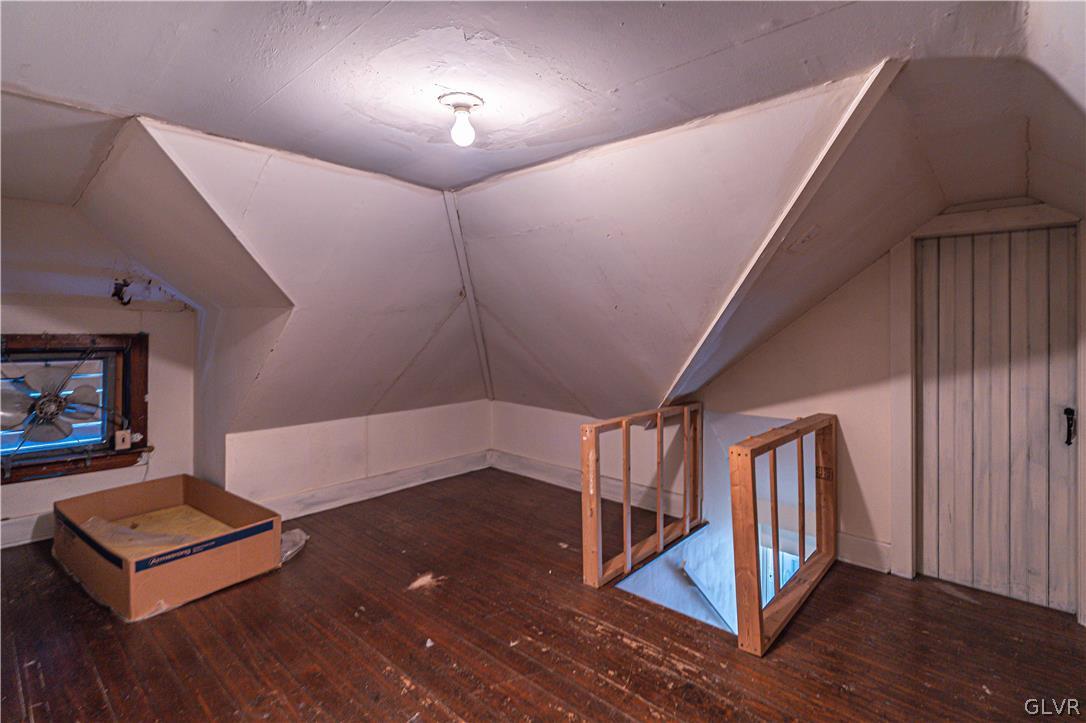 1177 Arcadia Street Bethlehem, PA 18018 - Photo 23 of 32 a view of an empty room with wooden floor and a ceiling fan