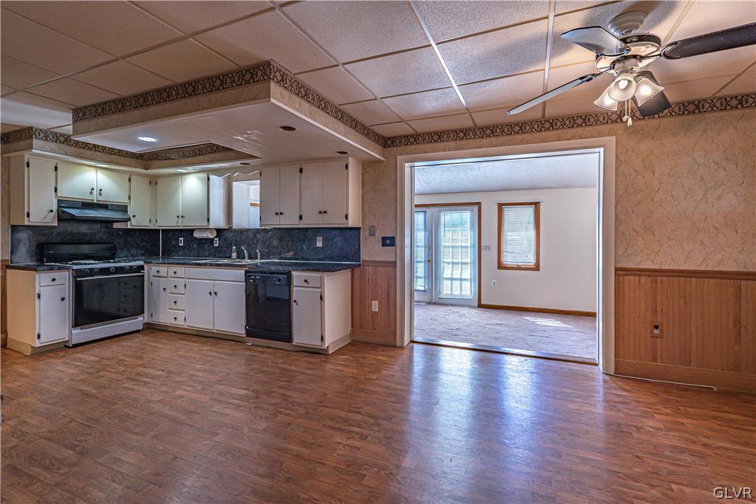 1177 Arcadia Street Bethlehem, PA 18018 - Photo 6 of 32 a large kitchen with stainless steel appliances granite countertop a stove a sink dishwasher and a oven with wooden floor