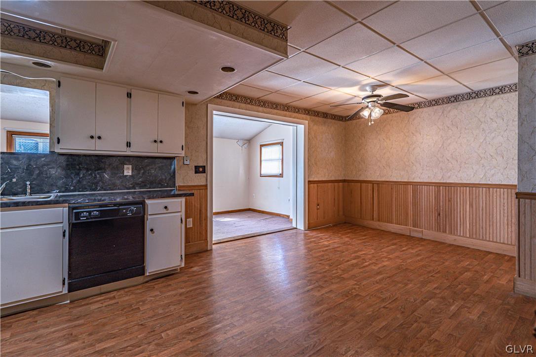 1177 Arcadia Street Bethlehem, PA 18018 - Photo 7 of 32 a kitchen with stainless steel appliances granite countertop a stove cabinets and wooden floor