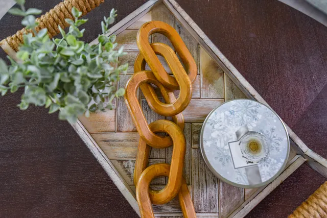 a large bedroom with a bed and glass walk in closet