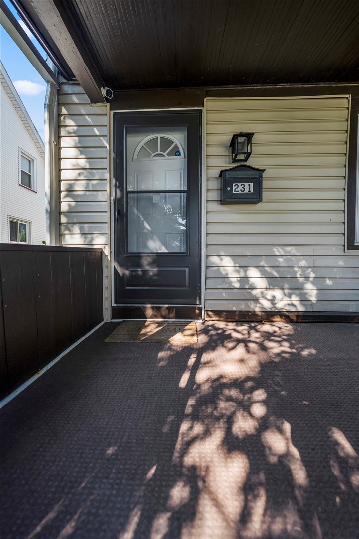 231 Garfield Street Rochester, NY 14611 - Photo 2 of 38 Open Front Porch/ Front entrance