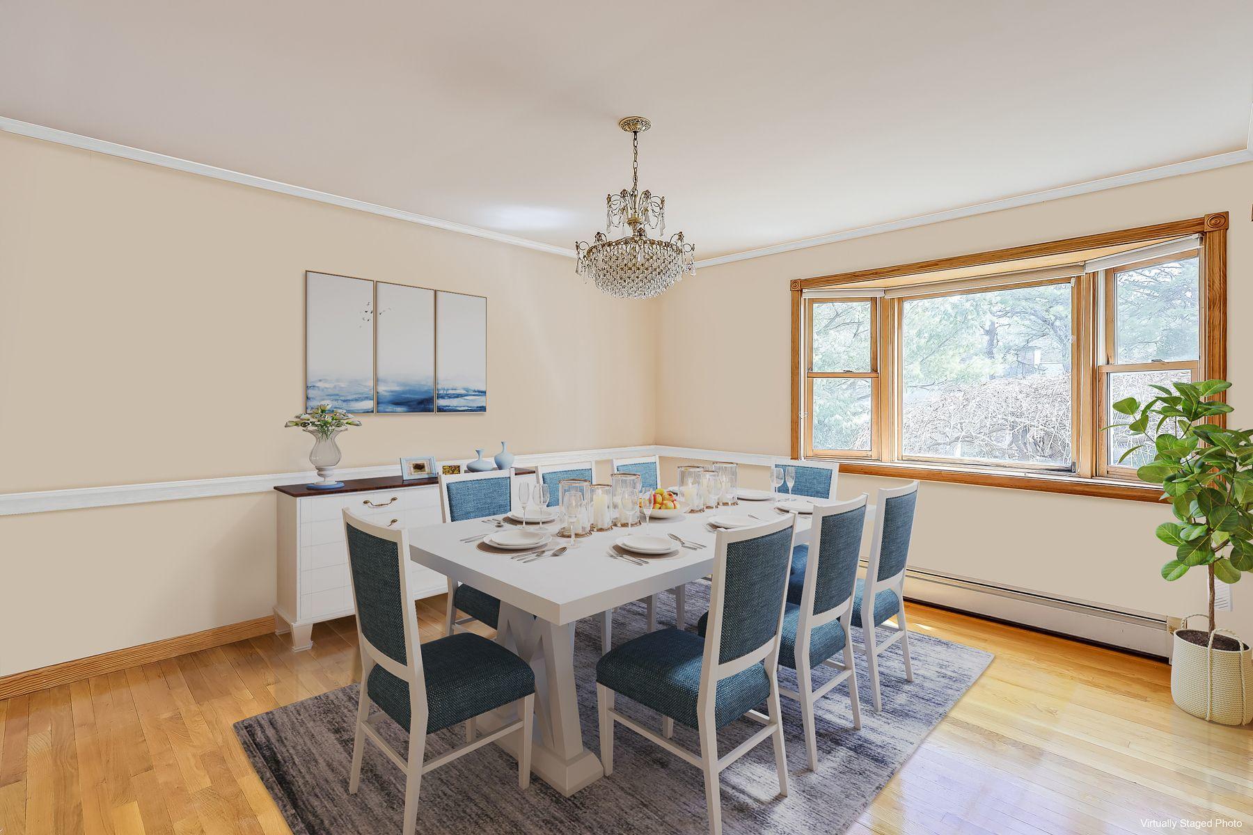 40 Meadowbrook Road Mashpee, MA 02649 - Photo 14 of 31 a view of a dining room with furniture window and wooden floor