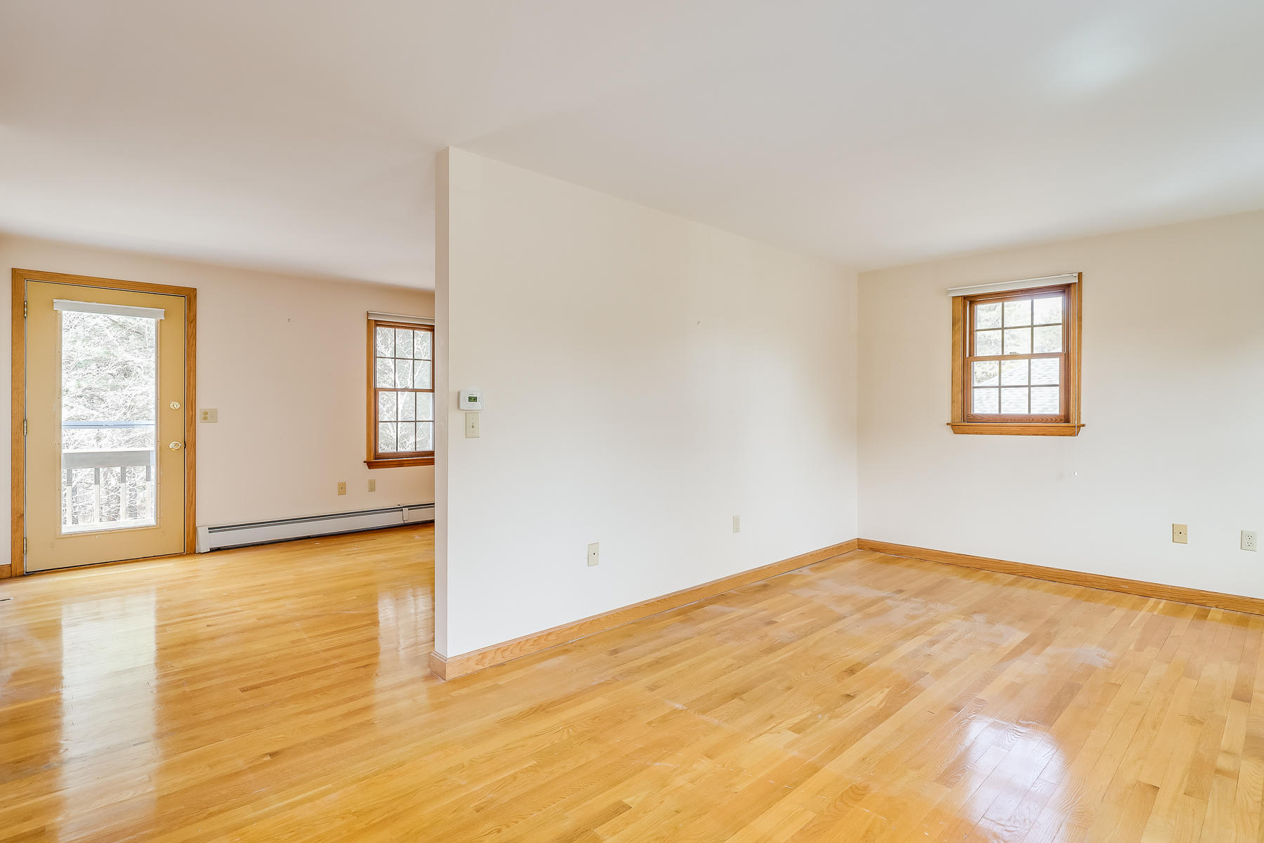40 Meadowbrook Road Mashpee, MA 02649 - Photo 21 of 31 a view of empty room with wooden floor and fan