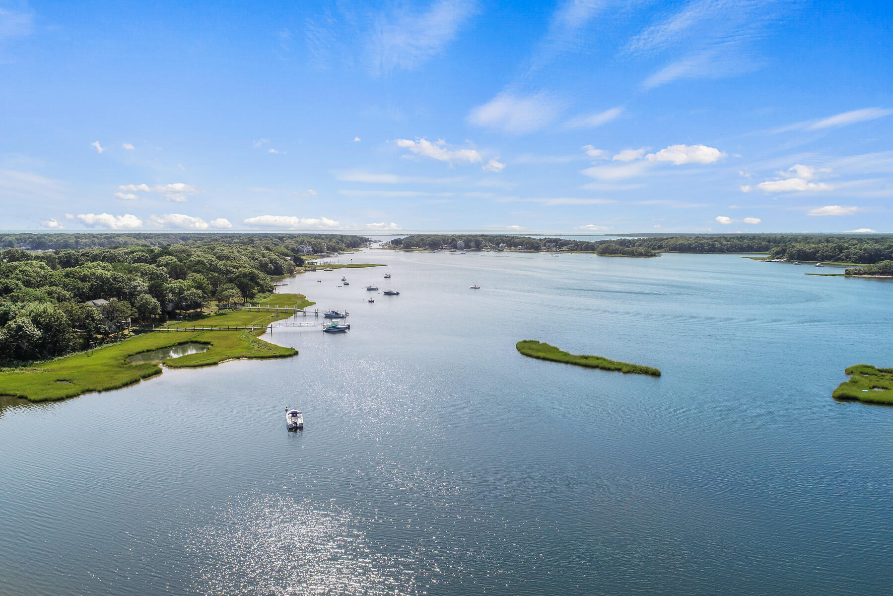 40 Meadowbrook Road Mashpee, MA 02649 - Photo 28 of 31 a view of a lake with a mountain