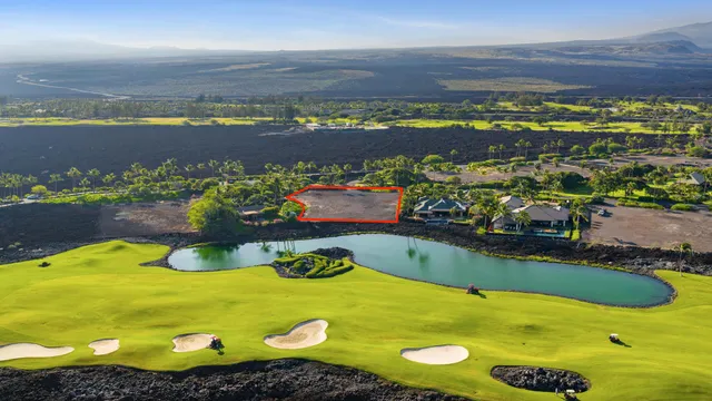 a view of a swimming pool with an ocean view