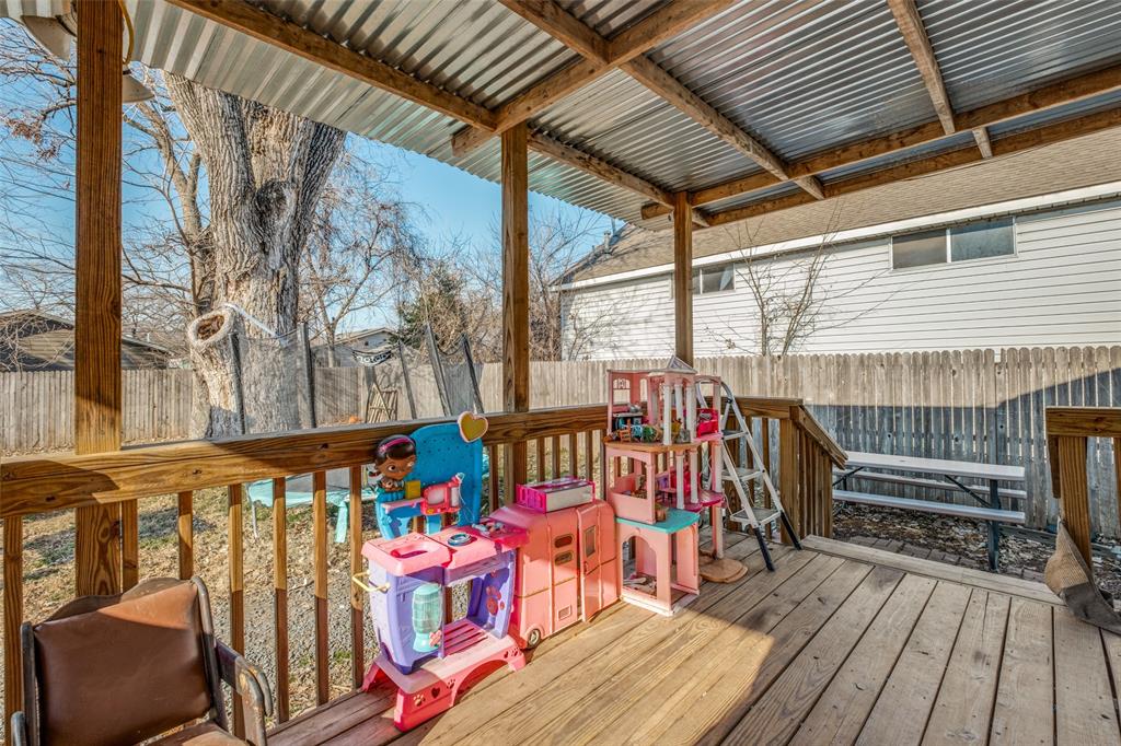 4755 Yancy Street Dallas, TX 75216 - Photo 11 of 12 a view of an outdoor space with wooden floor and furniture