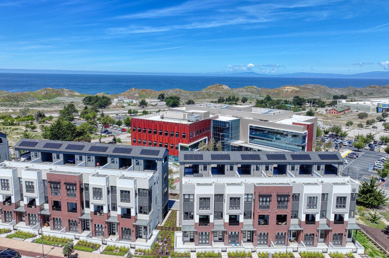 135 8th Street Marina, CA 93933 - Photo 3 of 69 a large building with a city view