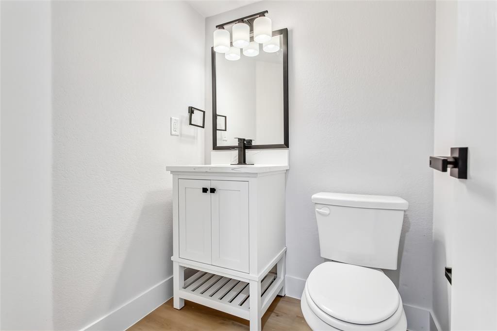 3615 Rio Blanco Drive Dallas, TX 75227 - Photo 3 of 23 Downstairs half bath for guests.