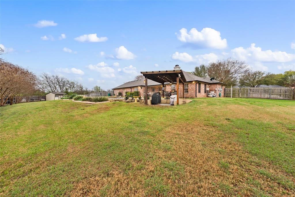 517 Chado Lane Robinson, TX 76706 - Photo 34 of 40 Fenced backyard featuring a patio