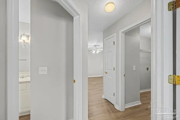 a view of a livingroom with wooden floor