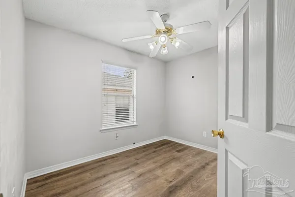 a view of empty room with a window