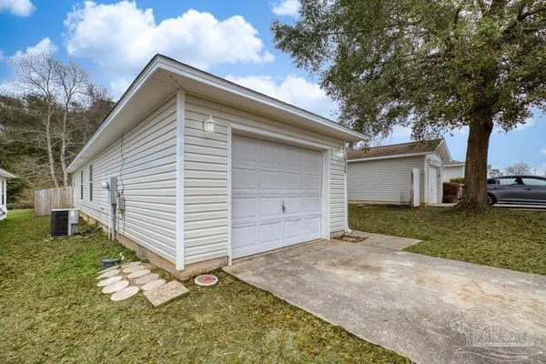 front view of a house with a big yard