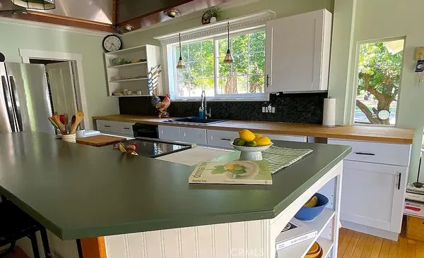 a view of a kitchen area with furniture and window
