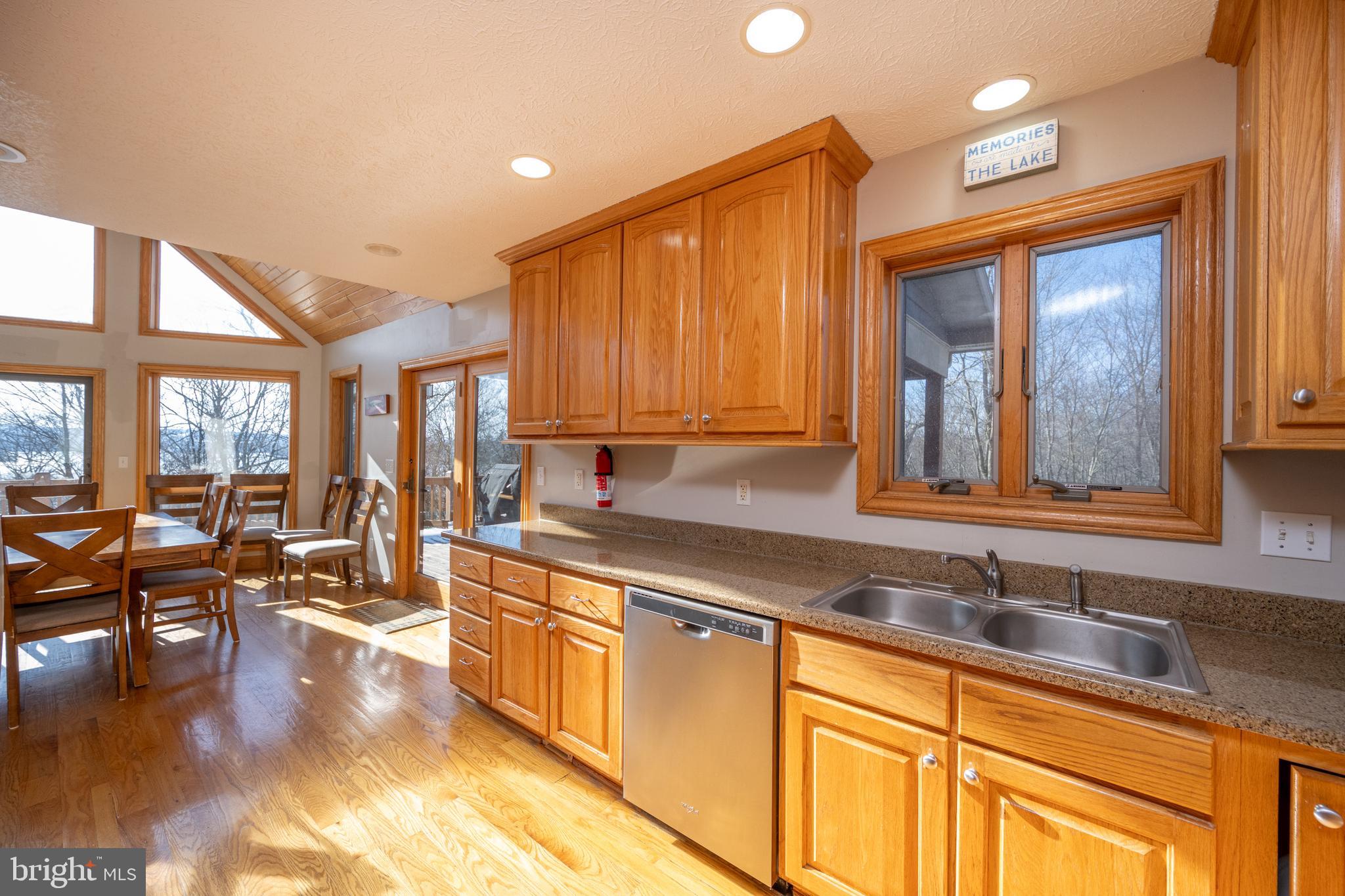 723 Pinnacle Drive Swanton, MD 21561 - Photo 12 of 107 Open to dining/living area and door to the deck.