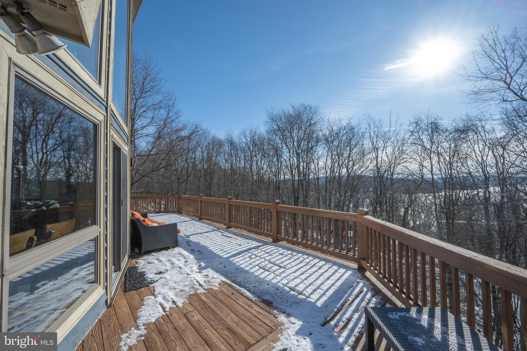 723 Pinnacle Drive Swanton, MD 21561 - Photo 29 of 107 Spacious wrap around deck on the main level.