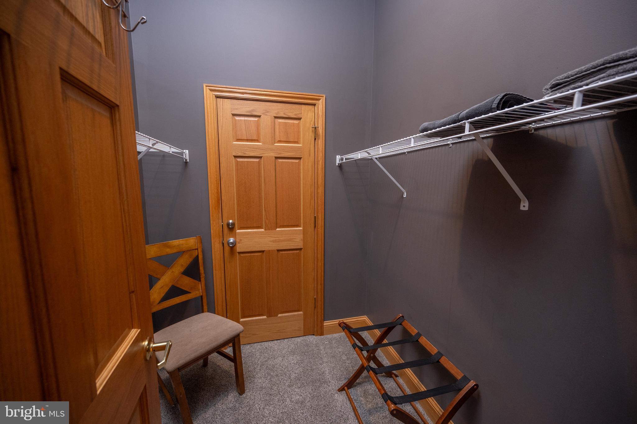 723 Pinnacle Drive Swanton, MD 21561 - Photo 41 of 107 Walk -in closet with an extra lock up area.
