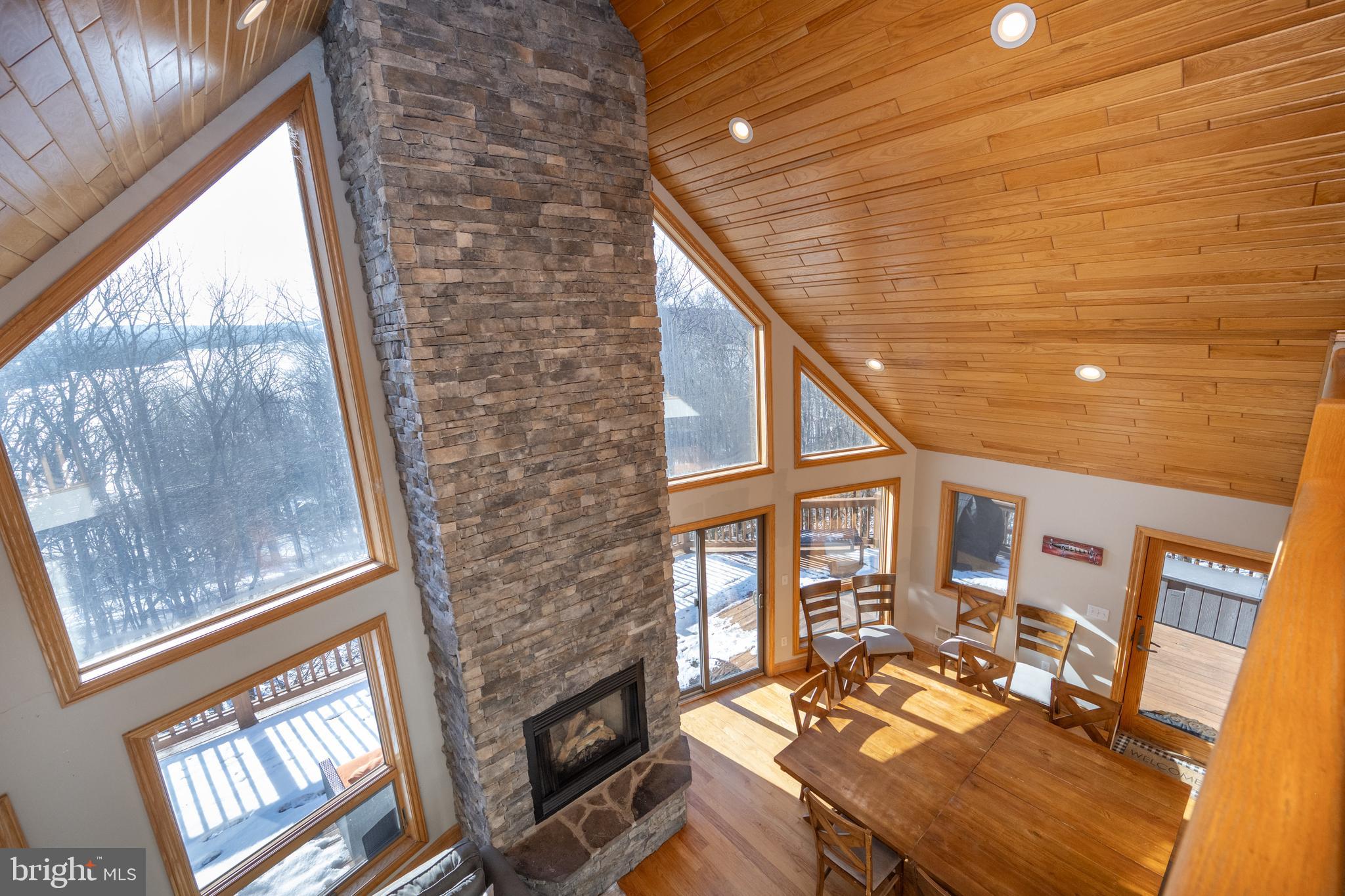 723 Pinnacle Drive Swanton, MD 21561 - Photo 6 of 112 Enter to soaring Ceiling-Stone FP & wall of glass,