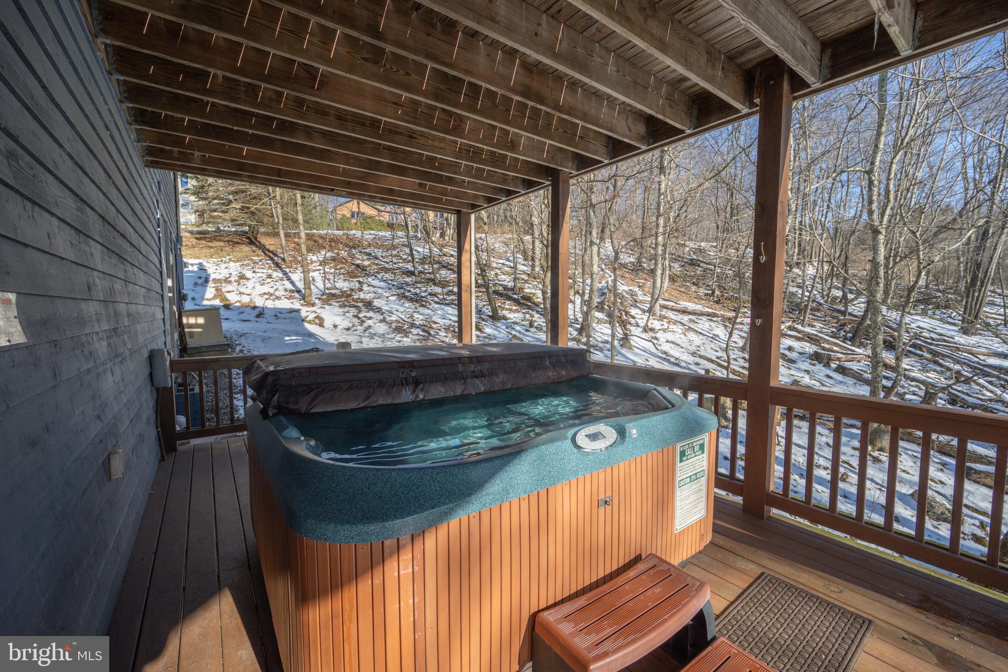 723 Pinnacle Drive Swanton, MD 21561 - Photo 71 of 107 Warm up in the hot tub after skiing or the lake.