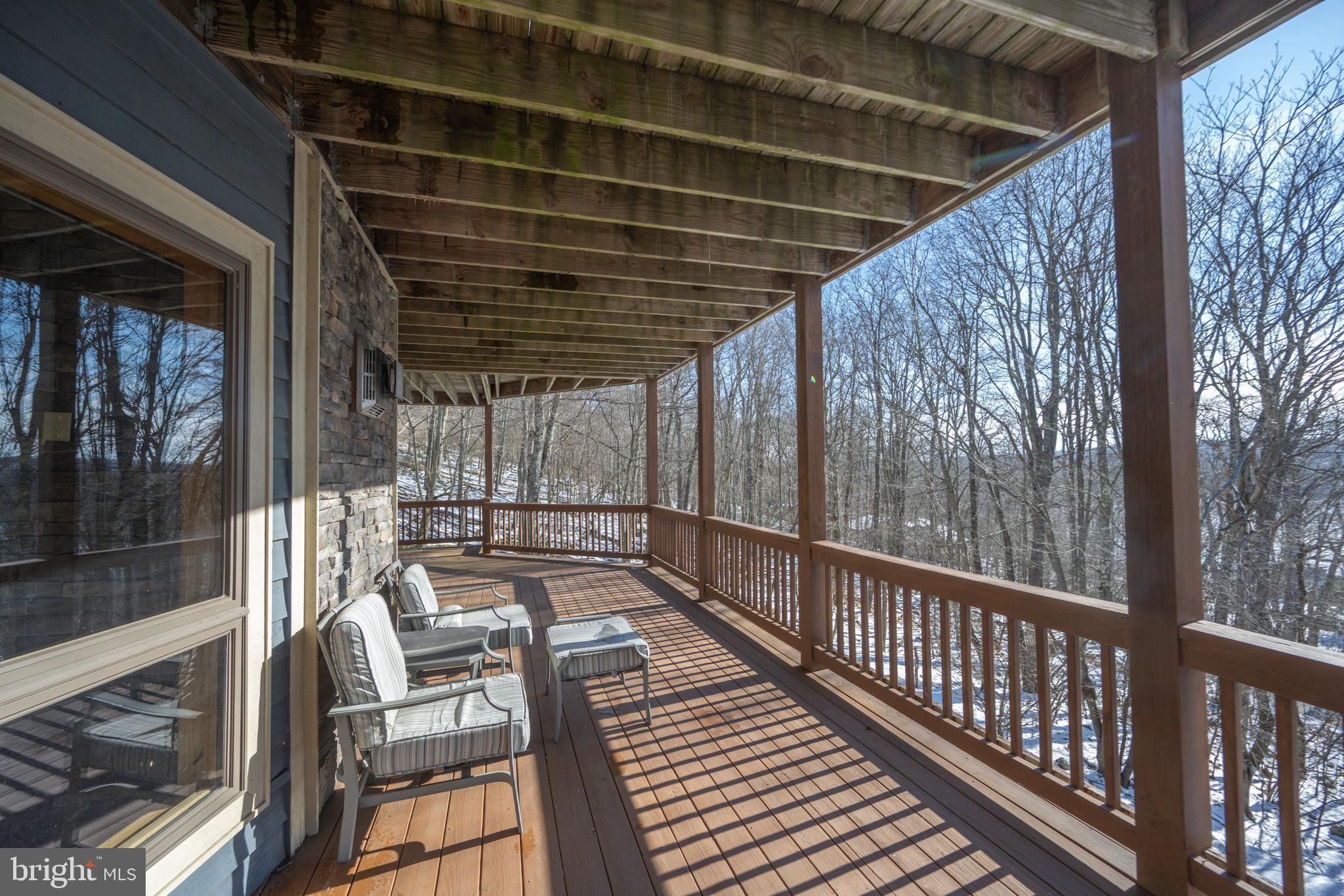 723 Pinnacle Drive Swanton, MD 21561 - Photo 72 of 112 Wrap around deck on the lower level.
