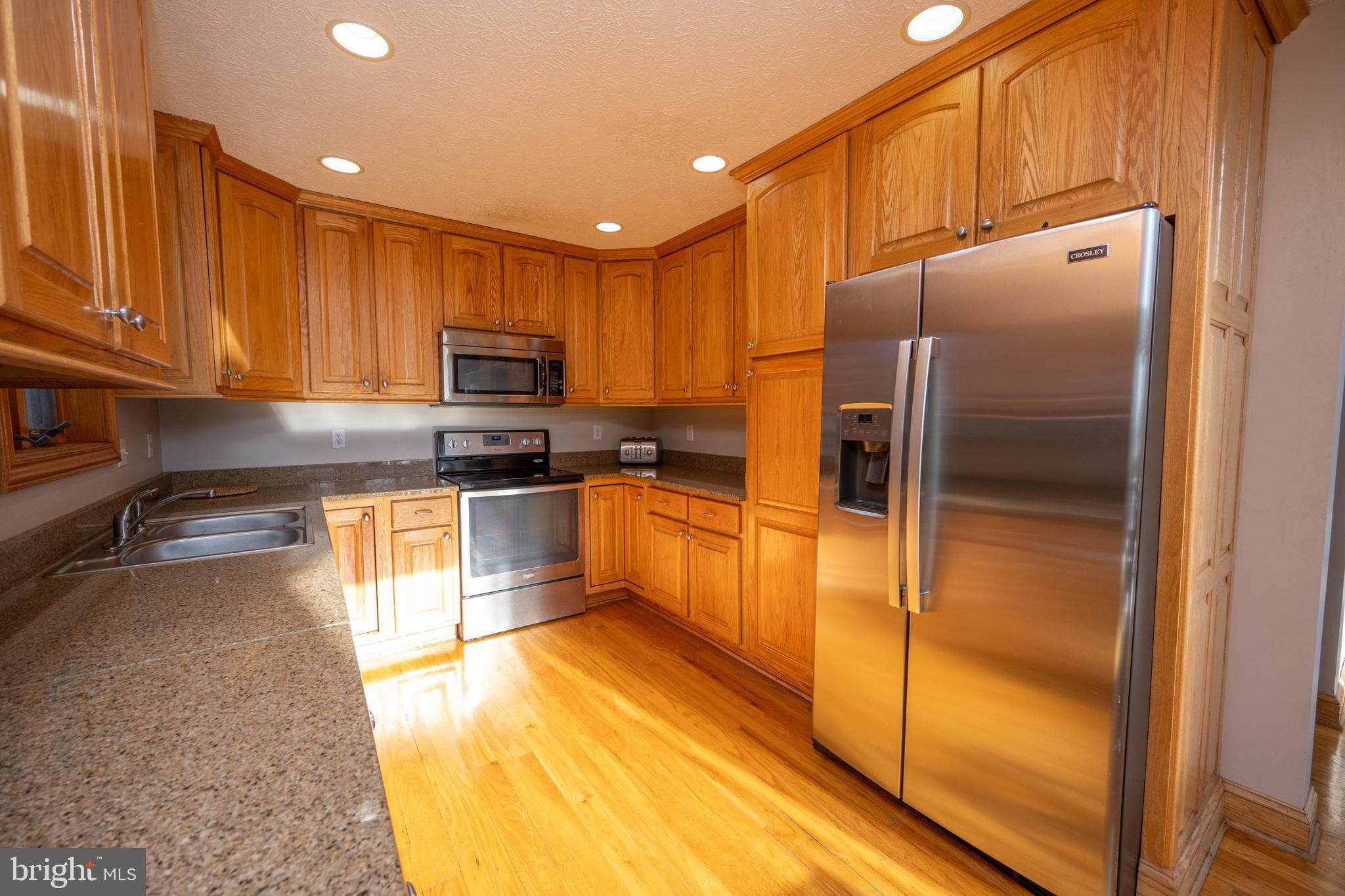 723 Pinnacle Drive Swanton, MD 21561 - Photo 10 of 107 Lots of counter space for meal prep.