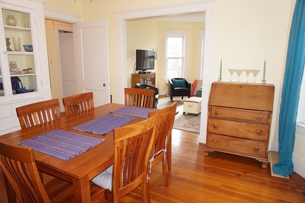 52 Patten Street, Unit 2 Boston, MA 02130 - Photo 6 of 18 a view of a dining room with furniture and wooden floor