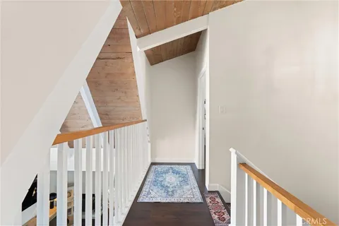 a view of staircase with white walls