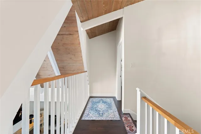 a view of staircase with white walls