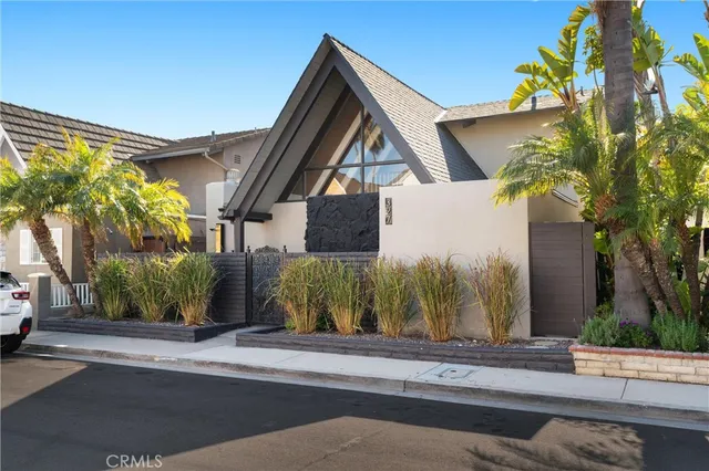 a view of a house with a street
