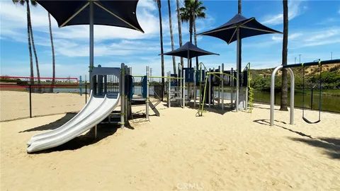 a swimming pool with an outdoor seating