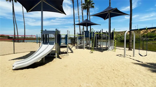 a swimming pool with an outdoor seating