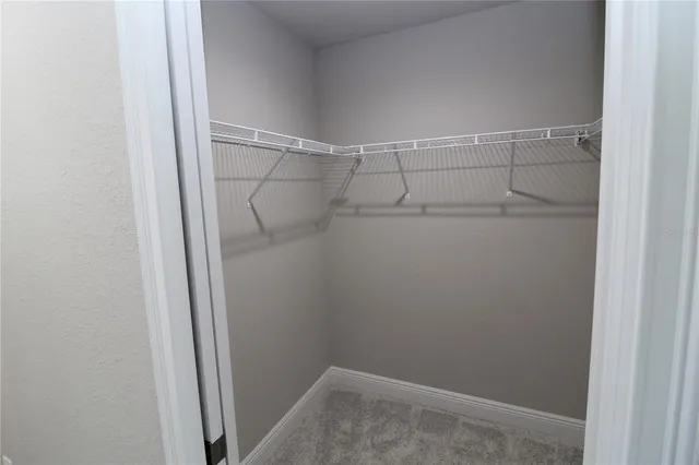 a view of a room with racks on the wall