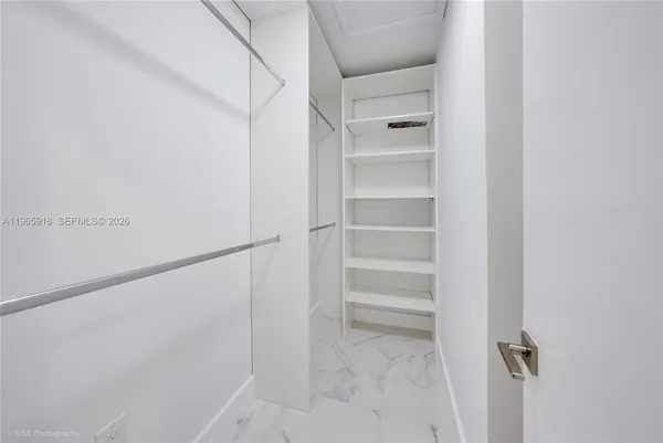 a view of a room that has a window in it