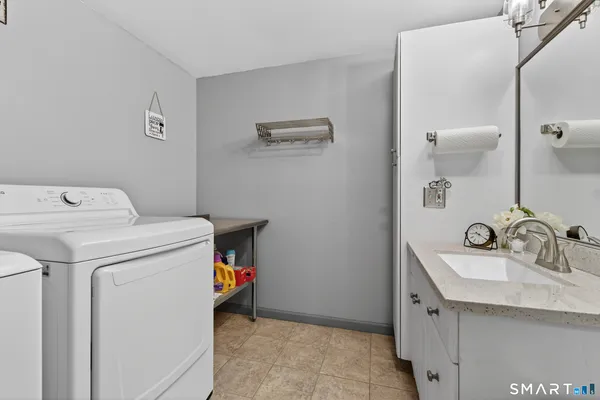 a utility room with dryer and washer